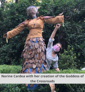 Norine Cardea with her creation of the Goddess of the Crossroads